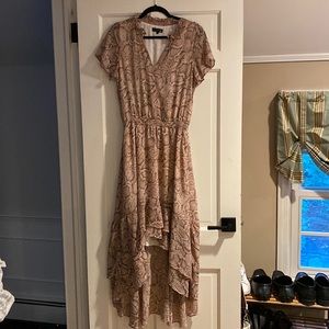 Beautiful snakeskin print dress. Shorter in front